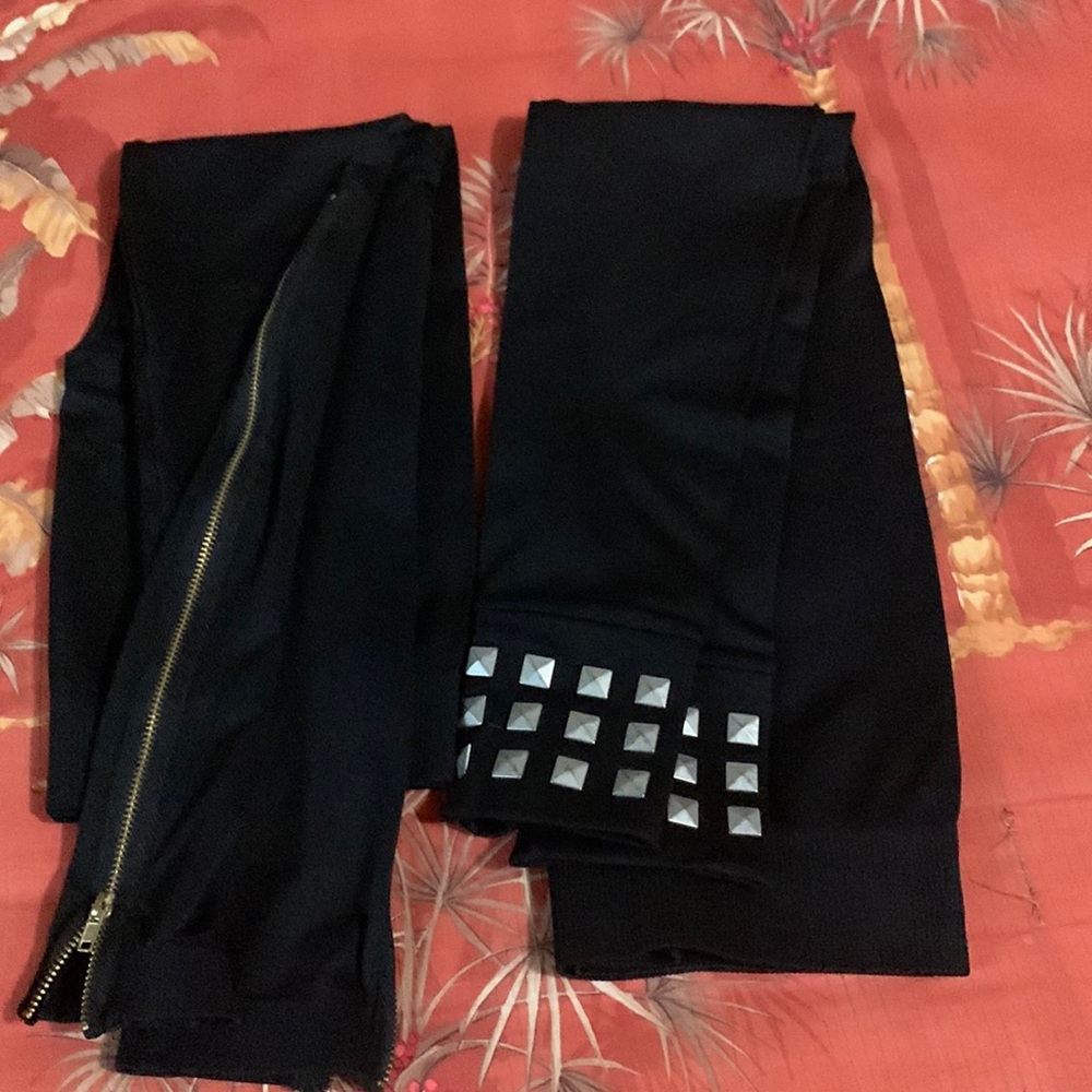 2 pairs of footless black tights/leggings with detailed bottom size small